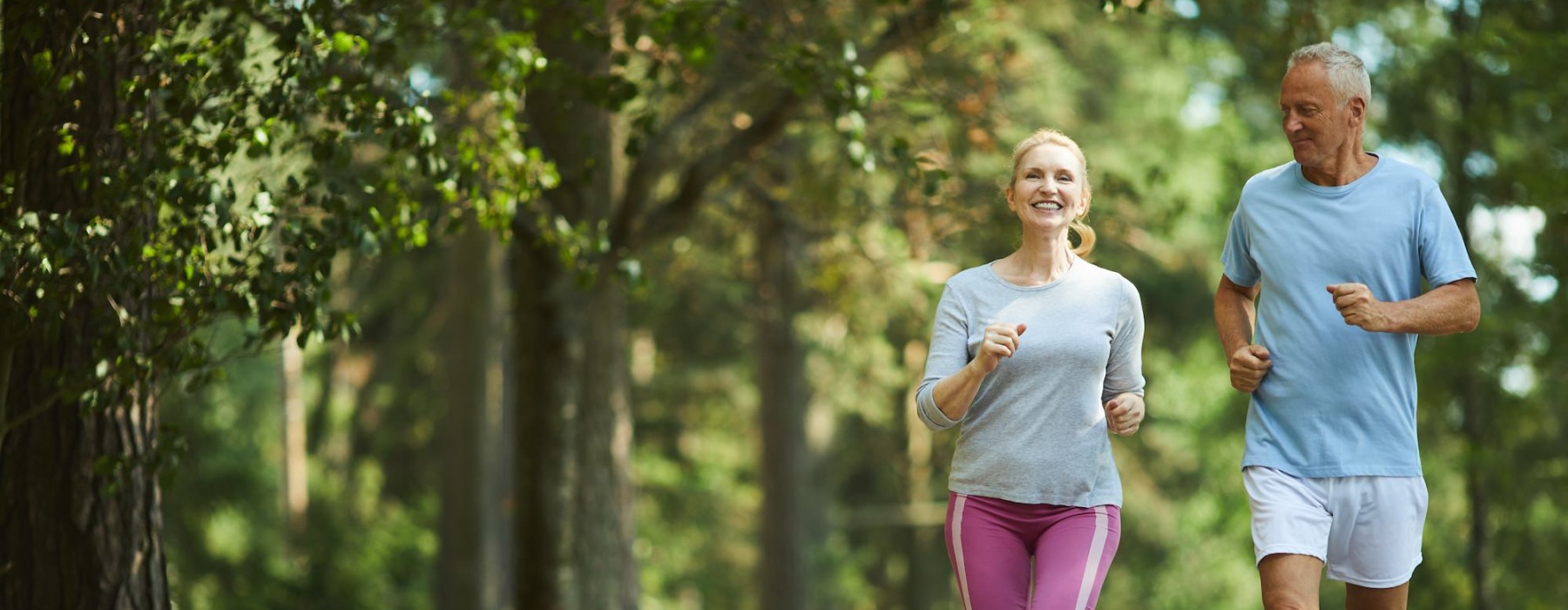a couple running outdoors