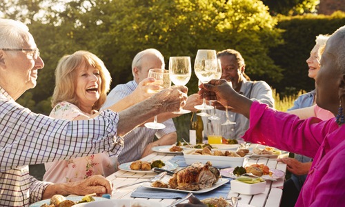 People having dinner together al fresco