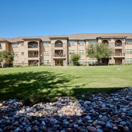Happy First Day of Spring! Enjoy these nice weather and take a walk in our beautiful courtyard! 
Comment your favorite thing about SPRING! The exterior of Aviva Fort Worth Apartments in Fort Worth, Texas, featuring a modern facade and grassy lawn.